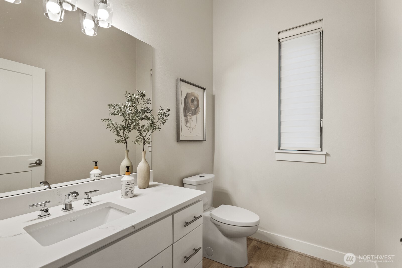 4526 327th Place Northeast Carnation, WA 98014 - Photo 13 of 36 a bathroom with a toilet sink and mirror