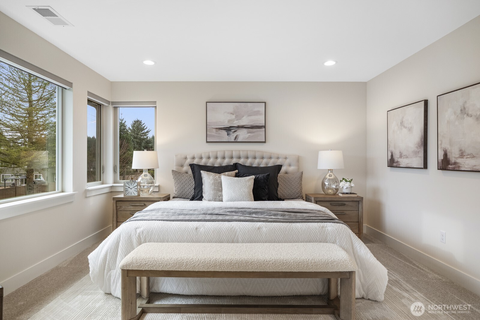 4526 327th Place Northeast Carnation, WA 98014 - Photo 17 of 36 a bed room with a bed and a large window