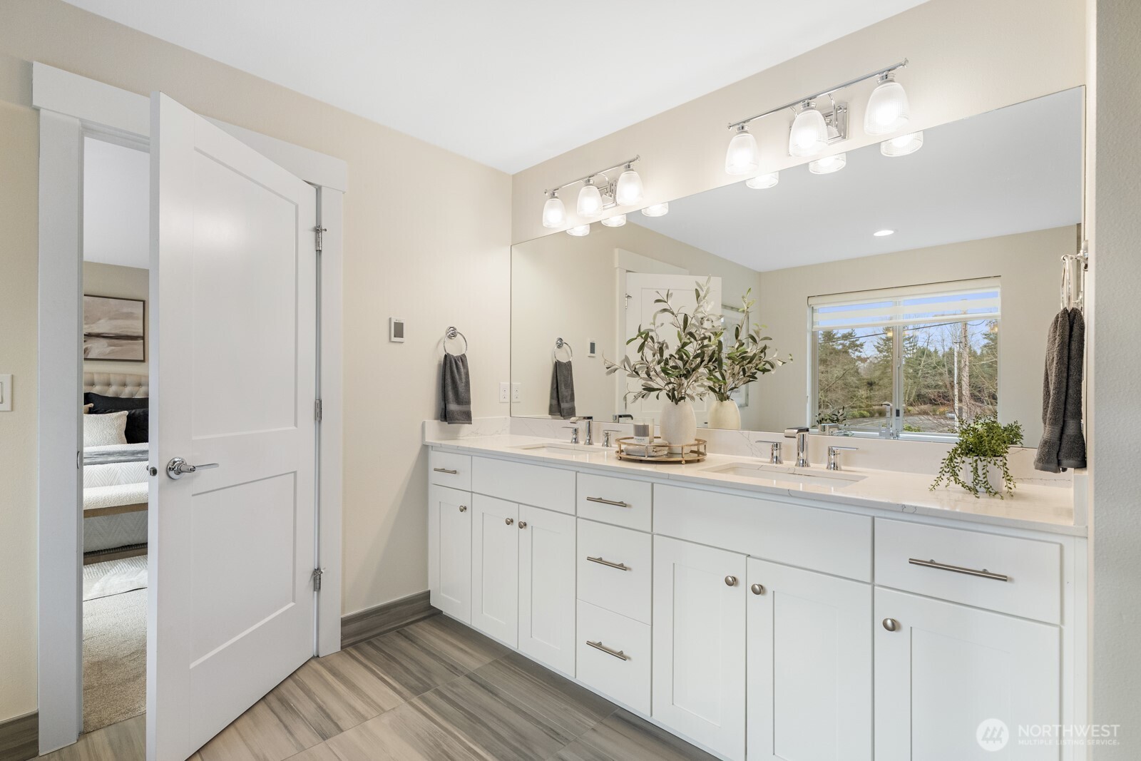 4526 327th Place Northeast Carnation, WA 98014 - Photo 20 of 36 a bathroom with a double vanity sink and a mirror