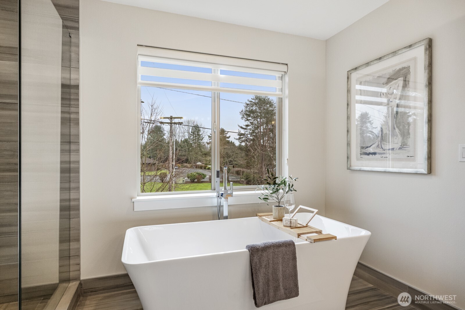 4526 327th Place Northeast Carnation, WA 98014 - Photo 21 of 36 a white bath tub sitting next to a window