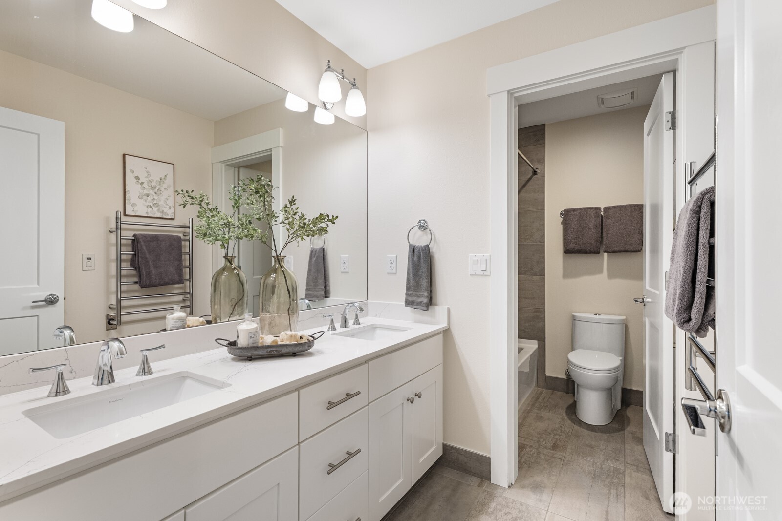 4526 327th Place Northeast Carnation, WA 98014 - Photo 27 of 36 a bathroom with a double vanity sink toilet and a mirror