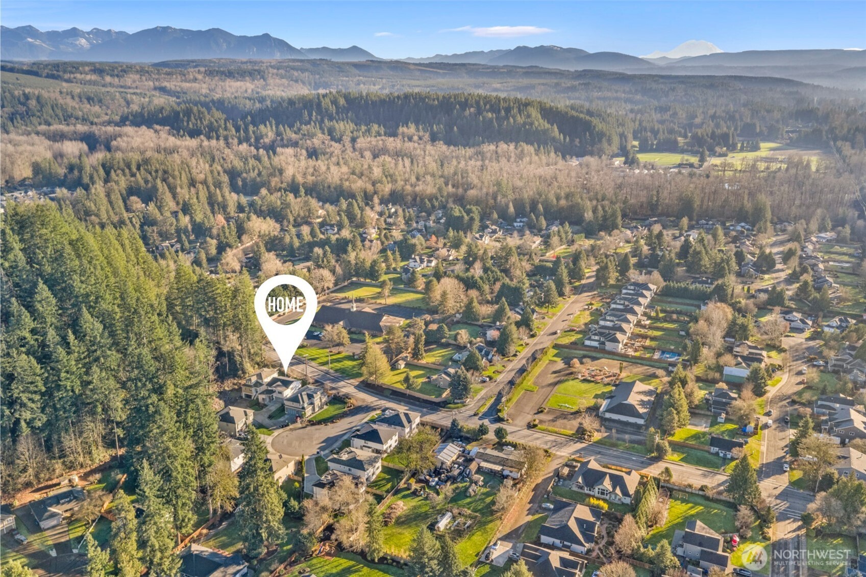 4526 327th Place Northeast Carnation, WA 98014 - Photo 35 of 36 a view of a lake with a mountain