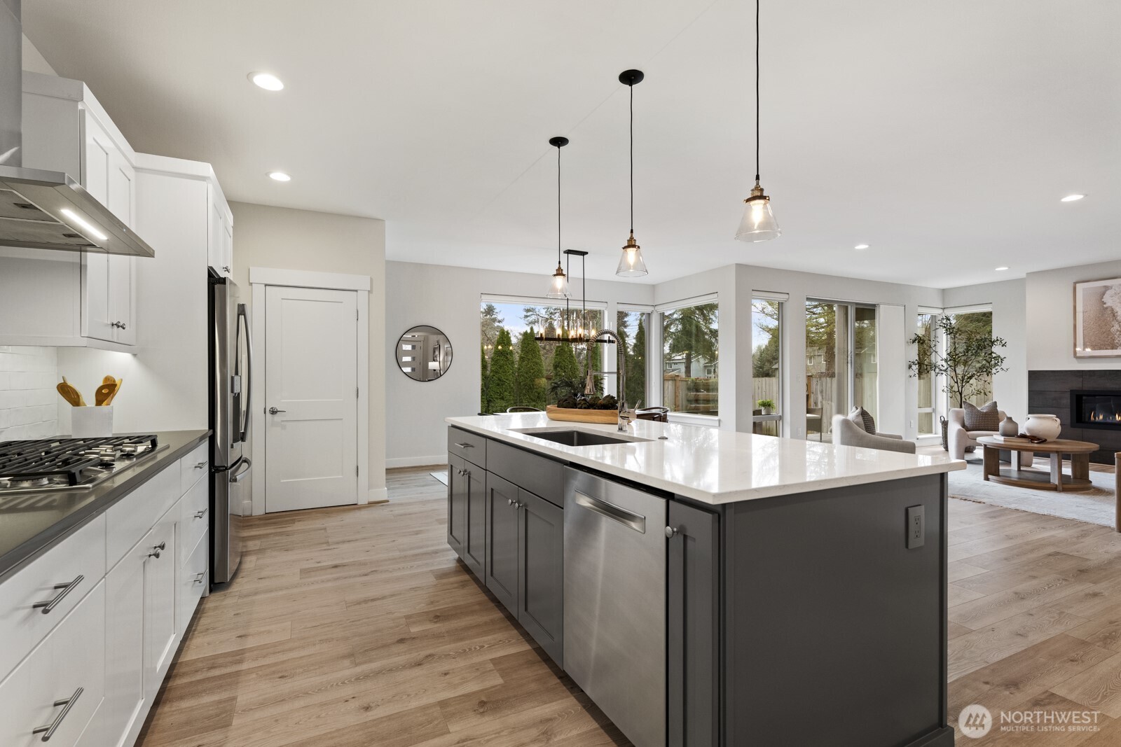 4526 327th Place Northeast Carnation, WA 98014 - Photo 6 of 36 a kitchen with stainless steel appliances granite countertop a sink and a stove