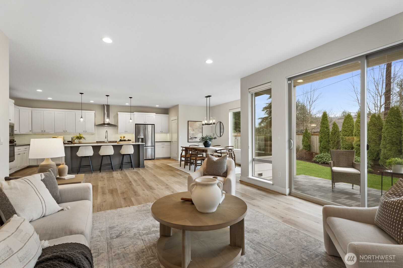 4526 327th Place Northeast Carnation, WA 98014 - Photo 8 of 36 a living room with furniture and a large window