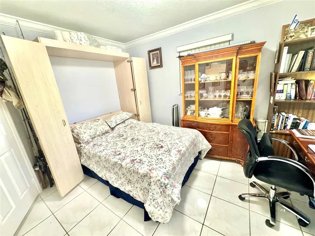 a view of a chairs and table in patio