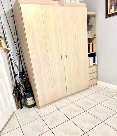 a view of a sitting area with furniture and in front of it