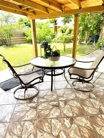 a view of a car in front of a house