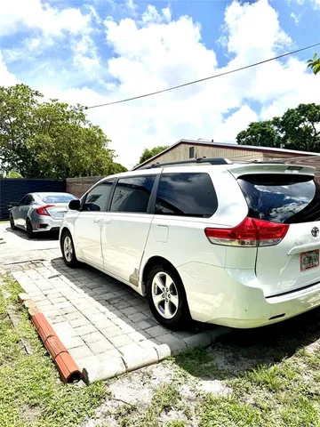 a car parked in front of a building