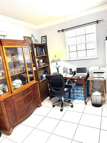 a kitchen with stainless steel appliances a stove a sink and cabinets