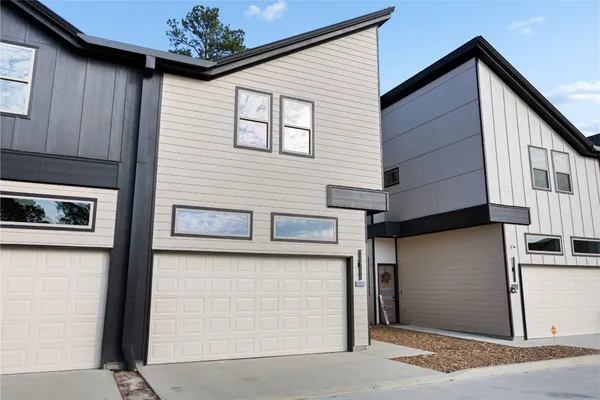 a view of a house with a garage