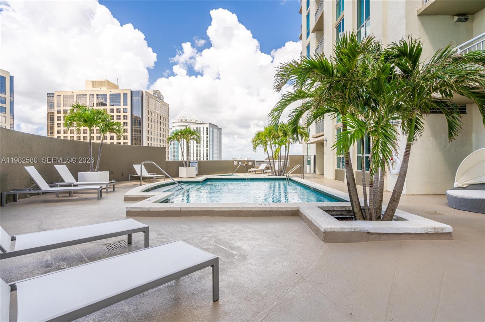 9055 Southwest 73rd Court, Unit 1104 Miami, FL 33156 - Photo 19 of 19 a view of balcony with furniture
