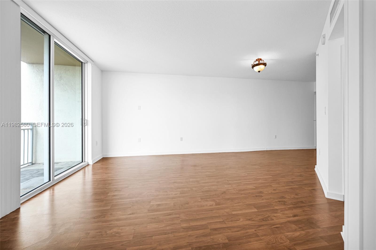 9055 Southwest 73rd Court, Unit 1104 Miami, FL 33156 - Photo 5 of 19 a view of an empty room