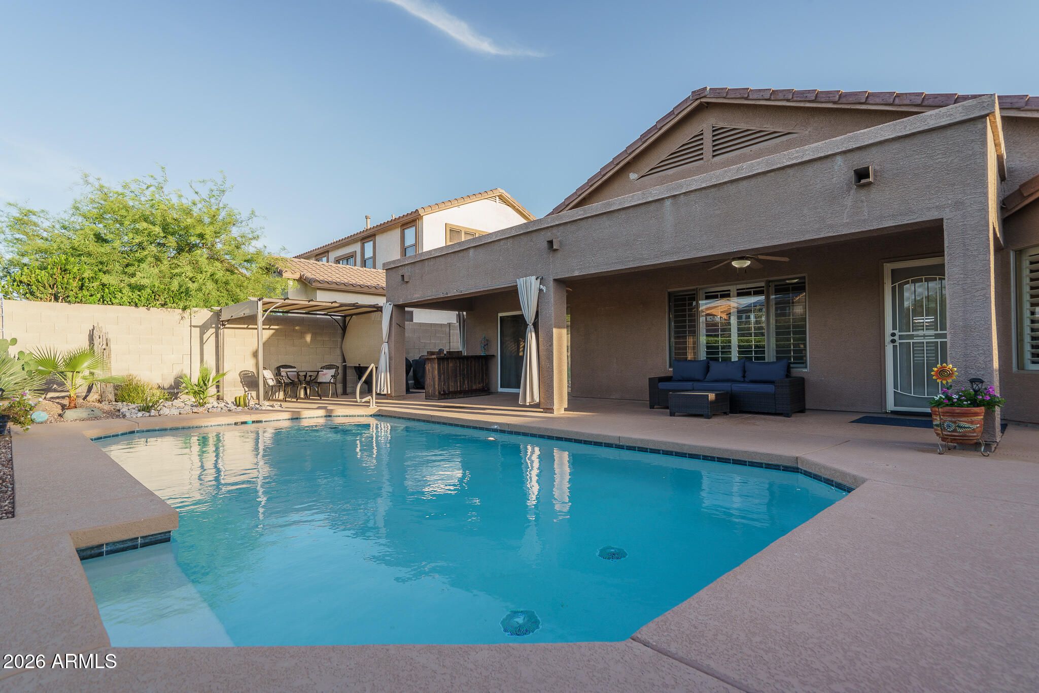 17542 West Rock Ledge Road Goodyear, AZ 85338 - Photo 22 of 66 22) BACK OF HOME