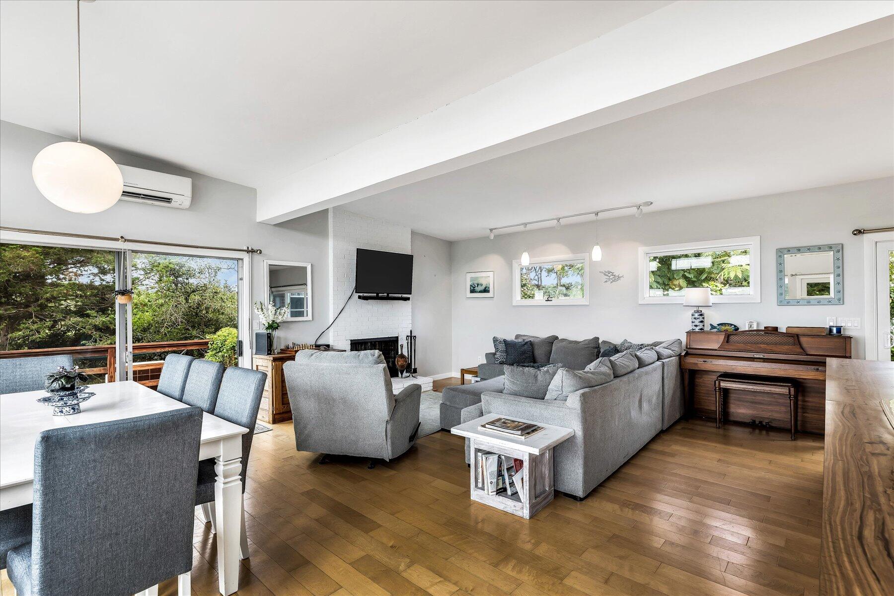 60 5th Avenue Wellfleet, MA 02667 - Photo 14 of 42 a living room with furniture and a large window
