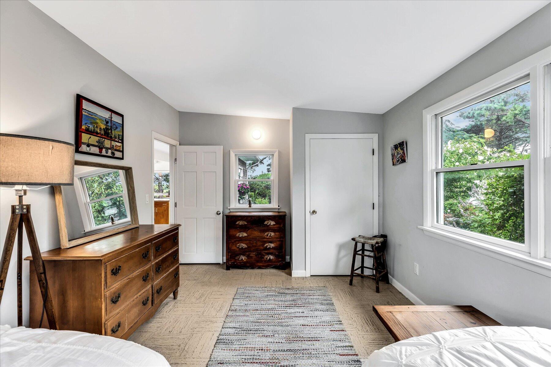 60 5th Avenue Wellfleet, MA 02667 - Photo 18 of 42 a bedroom with furniture and a window