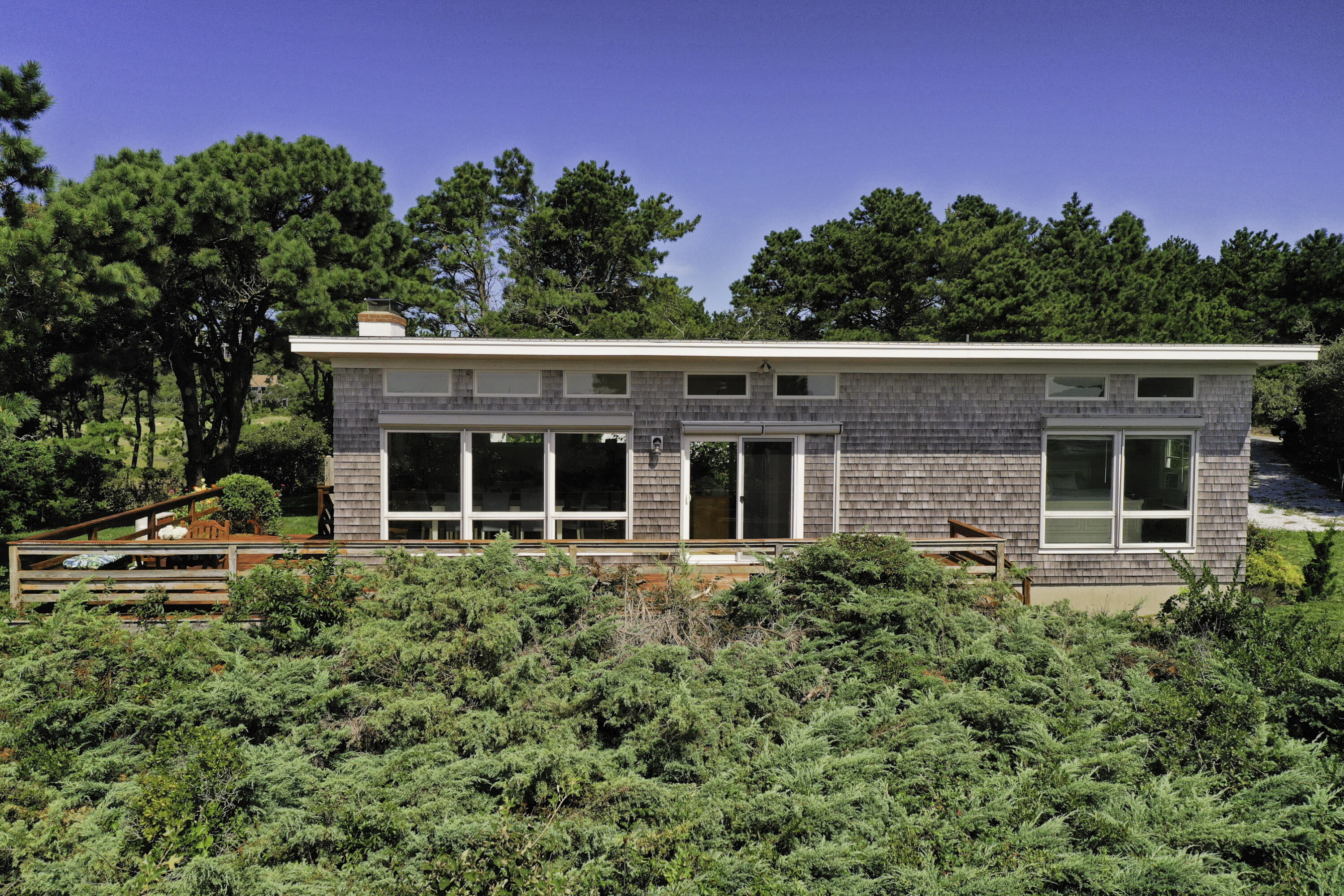 60 5th Avenue Wellfleet, MA 02667 - Photo 29 of 42 a view of a house with a yard