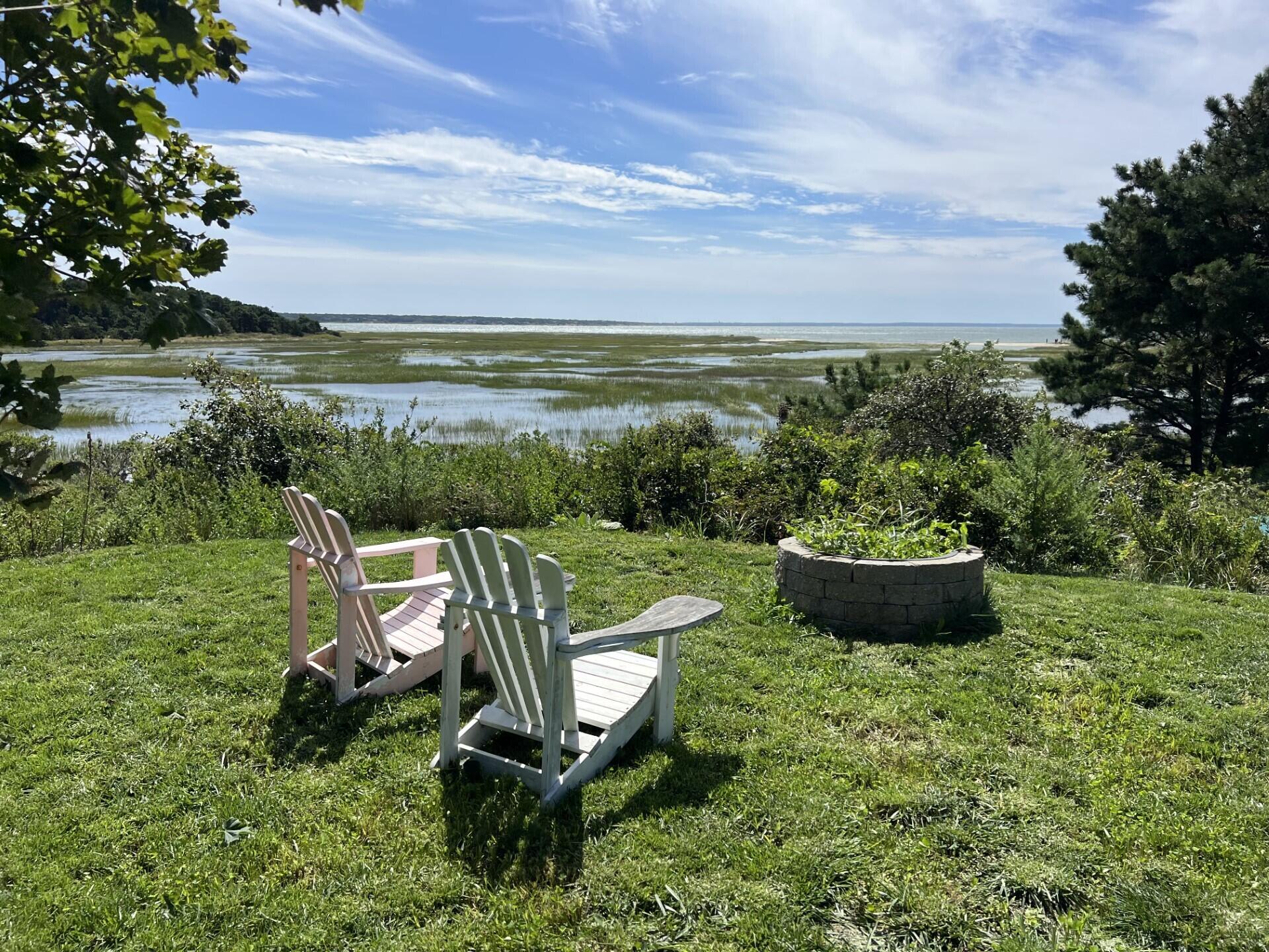 60 5th Avenue Wellfleet, MA 02667 - Photo 4 of 42 a view of a garden with lawn chairs