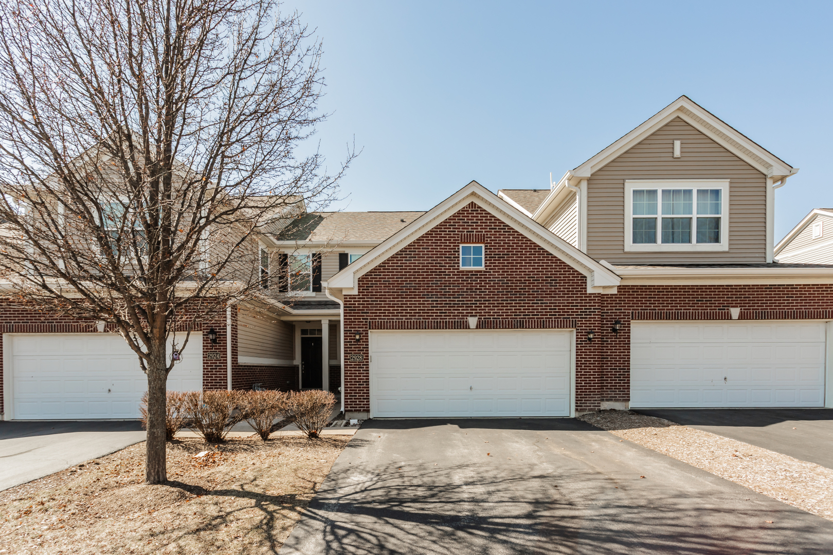2928 Church Road Aurora, IL 60502 - Photo 1 of 29 a front view of a house with a yard