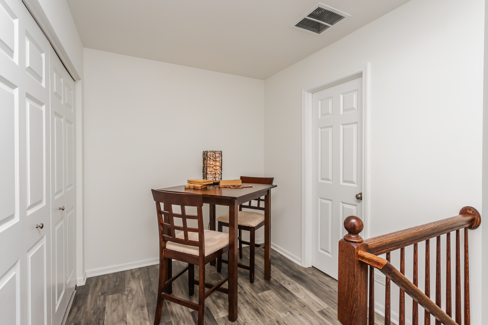 2928 Church Road Aurora, IL 60502 - Photo 16 of 29 a view of a room with furniture and wooden floor