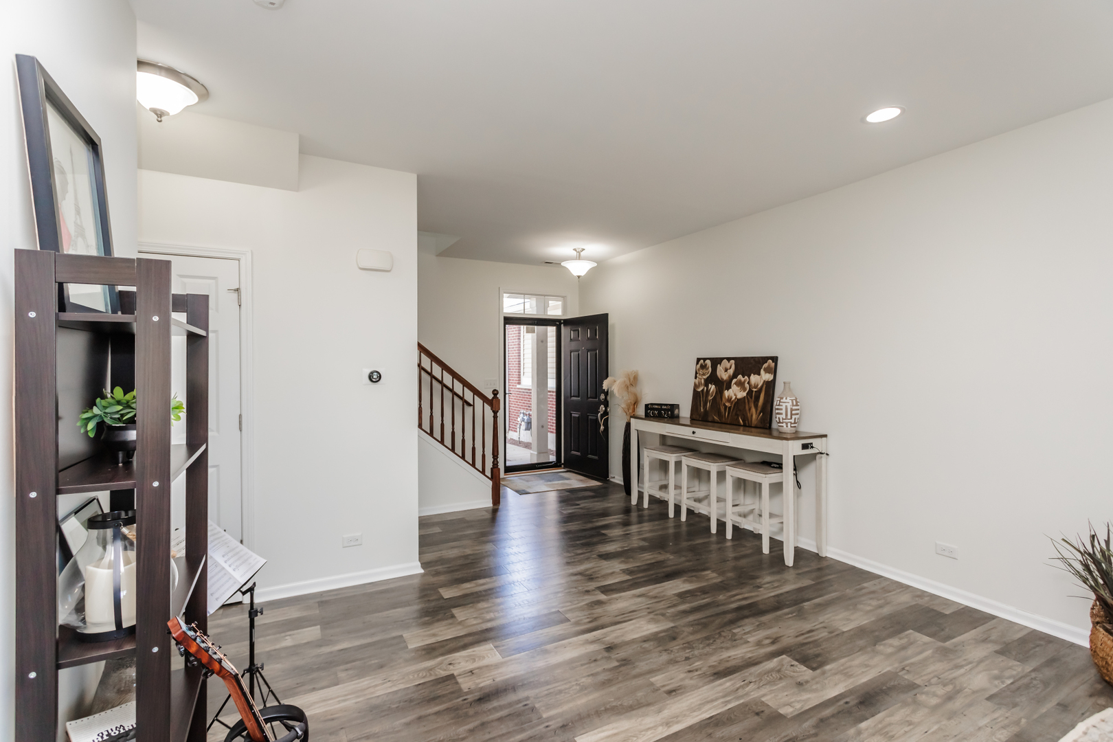 2928 Church Road Aurora, IL 60502 - Photo 3 of 29 a view of a dining room with furniture and wooden floor