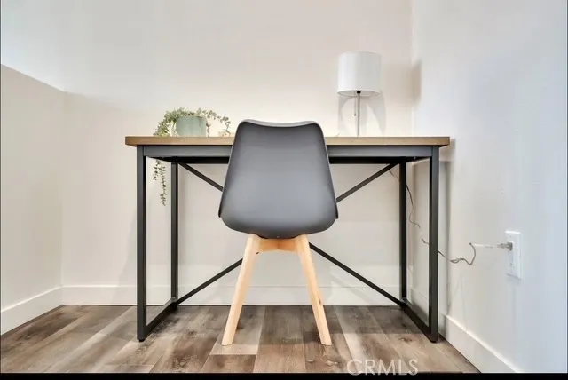 a view of livingroom with furniture and wooden floor