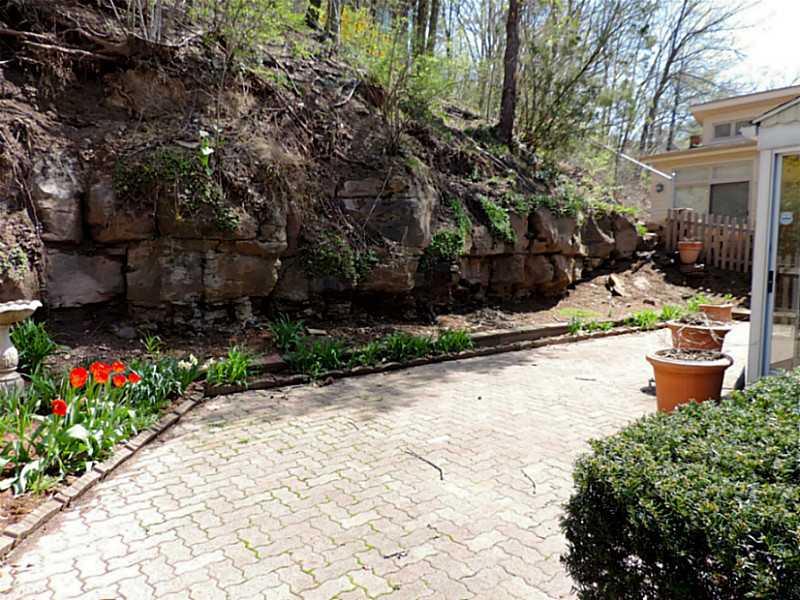 141 Techview Terrace Pittsburgh, PA 15213 - Photo 23 of 25 a view of a backyard with plants and patio