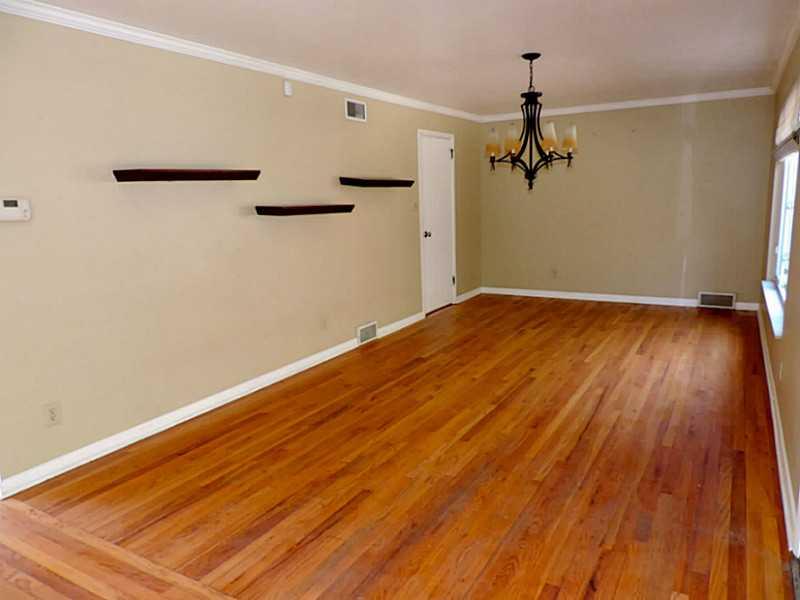 141 Techview Terrace Pittsburgh, PA 15213 - Photo 6 of 25 a view of a room with wooden floor and cabinet