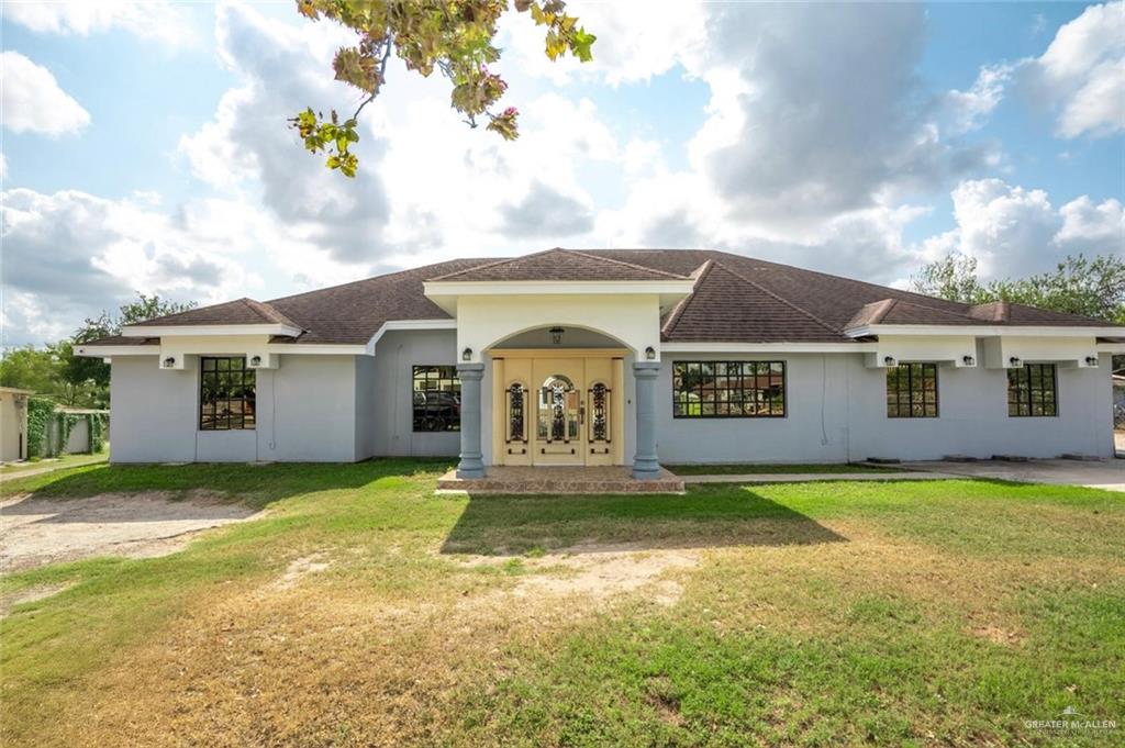 1608 Corales Street Mission, TX 78573 - Photo 7 of 29 a view of a house with pool yard and a yard