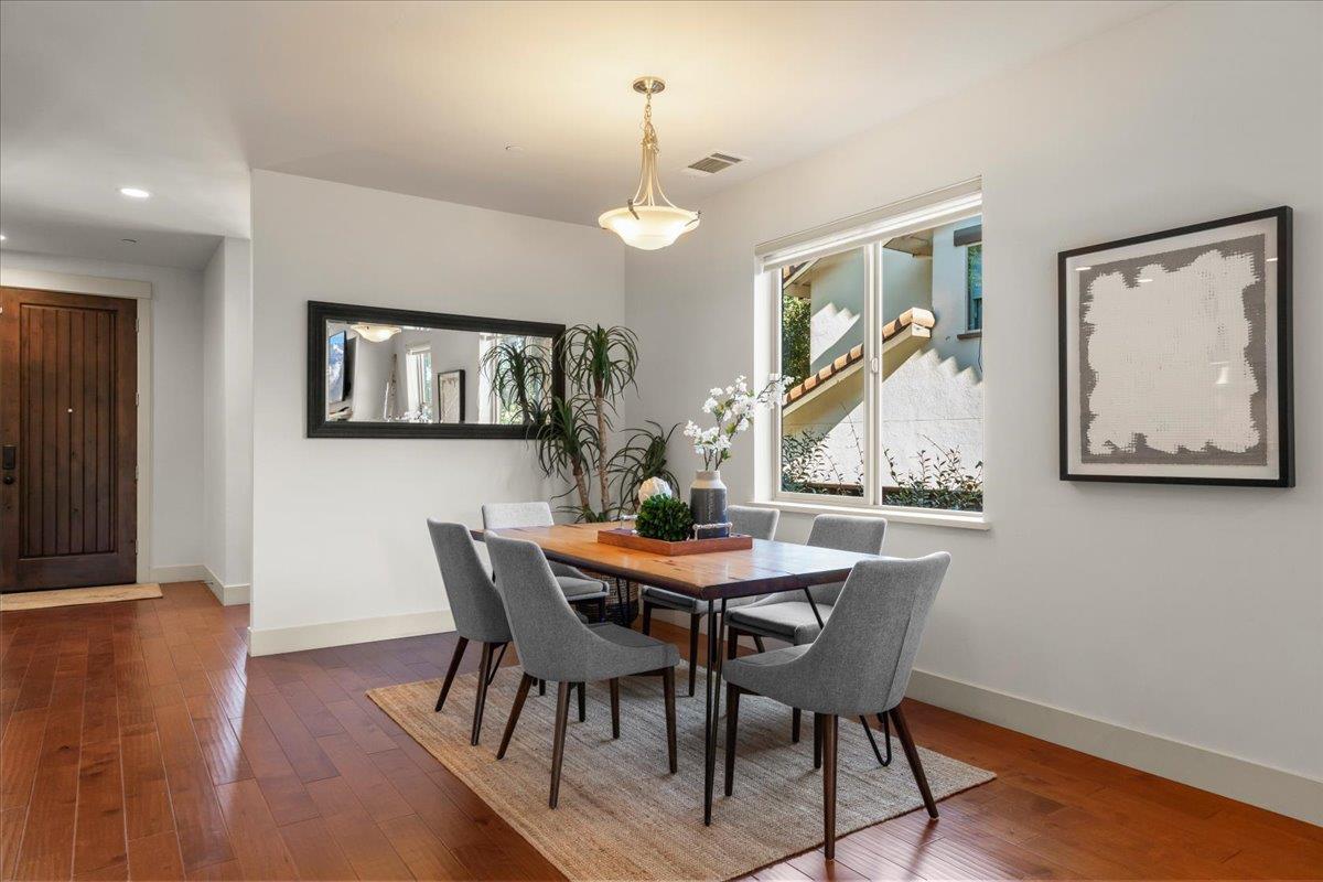361 Collado Drive Scotts Valley, CA 95066 - Photo 15 of 37 a view of a dining room with furniture and wooden floor
