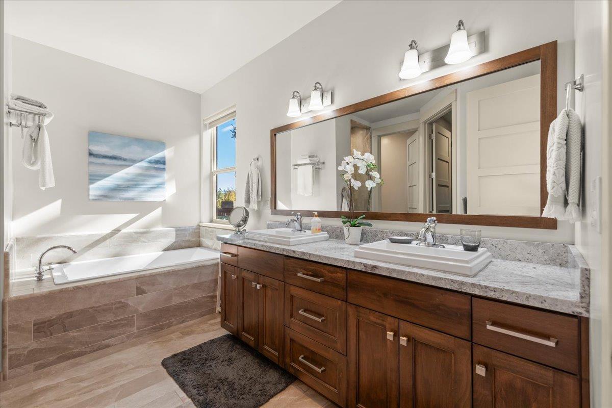 361 Collado Drive Scotts Valley, CA 95066 - Photo 20 of 37 a bathroom with a granite countertop double vanity sink and a mirror