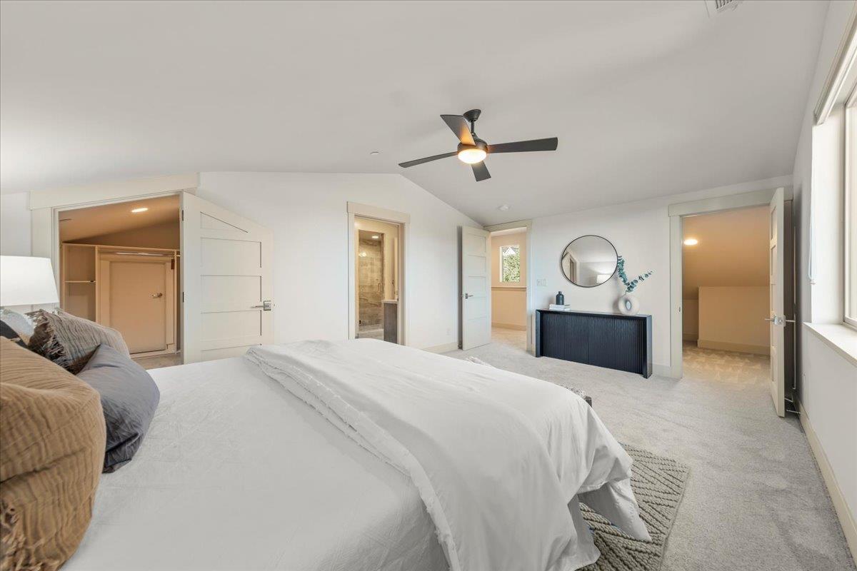 361 Collado Drive Scotts Valley, CA 95066 - Photo 26 of 37 a bedroom with a large bed and wooden floor