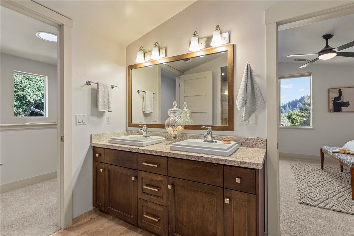 361 Collado Drive Scotts Valley, CA 95066 - Photo 30 of 37 a bathroom with a double vanity sink and a mirror