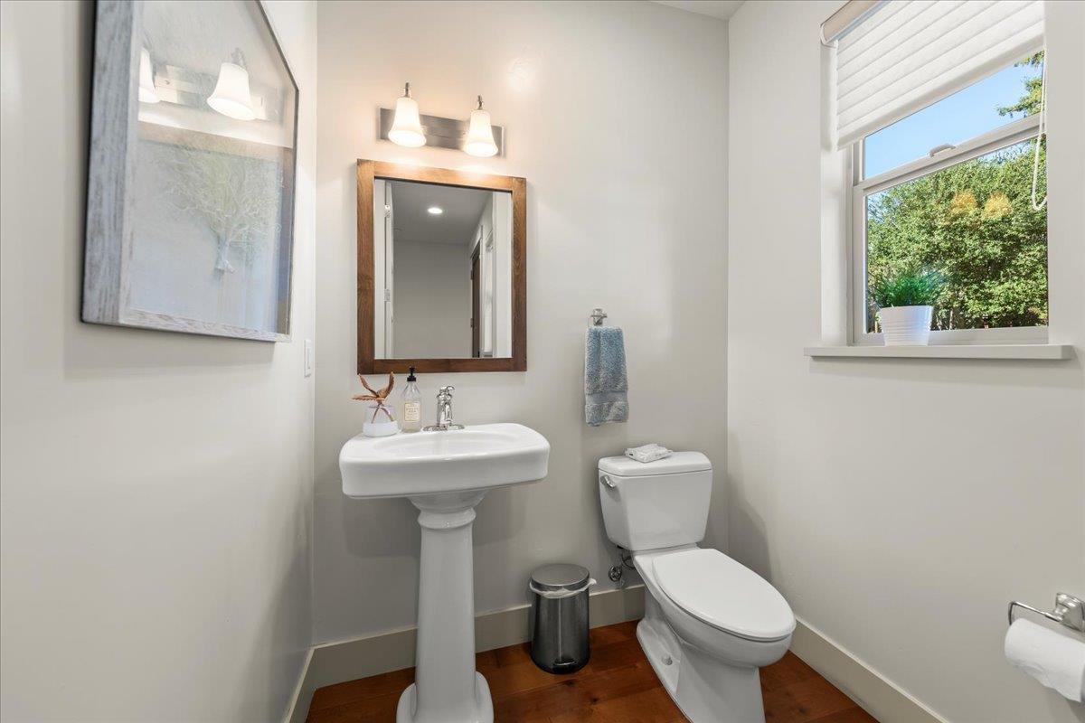 361 Collado Drive Scotts Valley, CA 95066 - Photo 4 of 37 a bathroom with a toilet sink and mirror