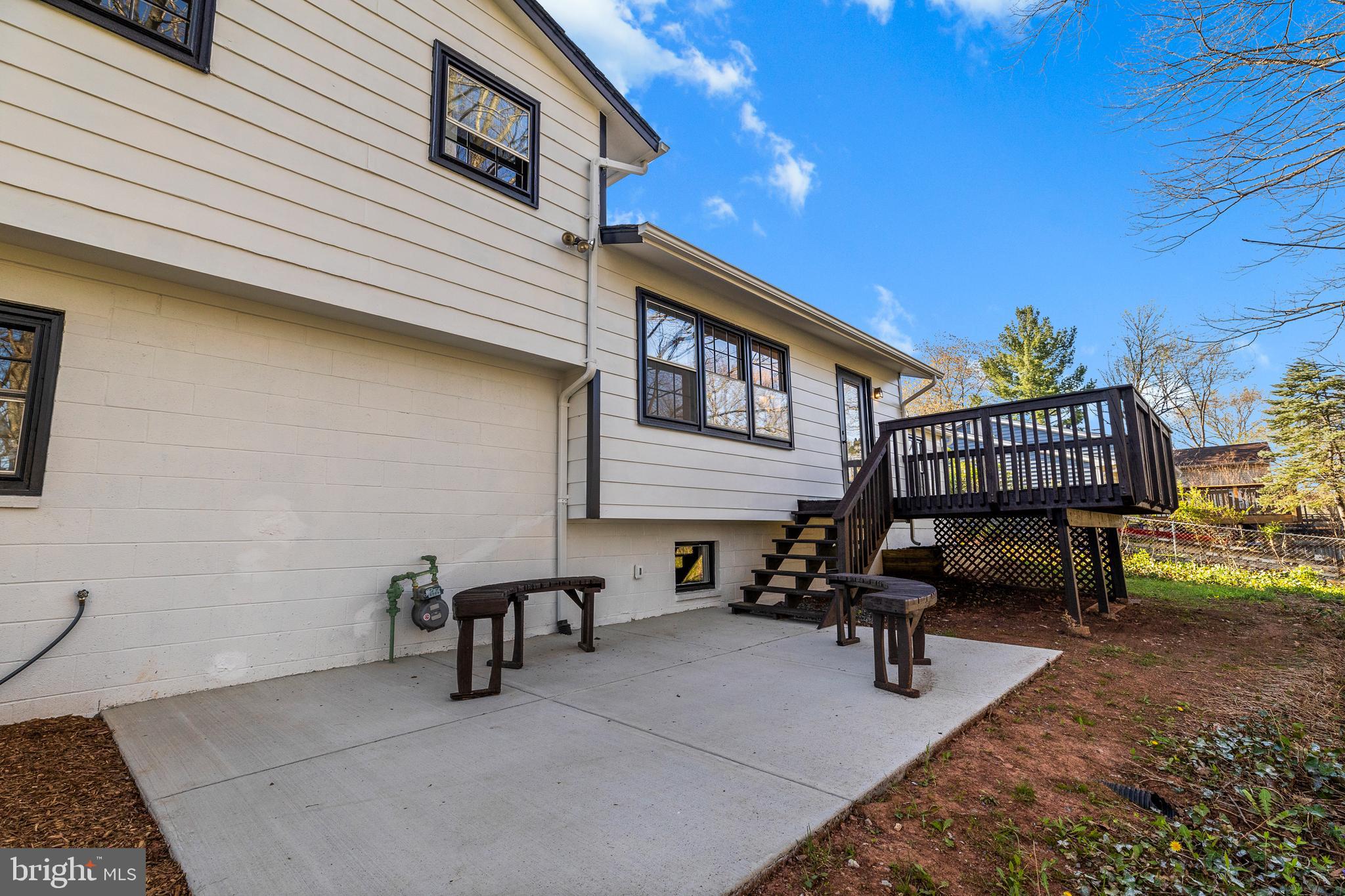 7517 Todd Place Manassas, VA 20109 - Photo 14 of 42 a view of patio with a table and chairs