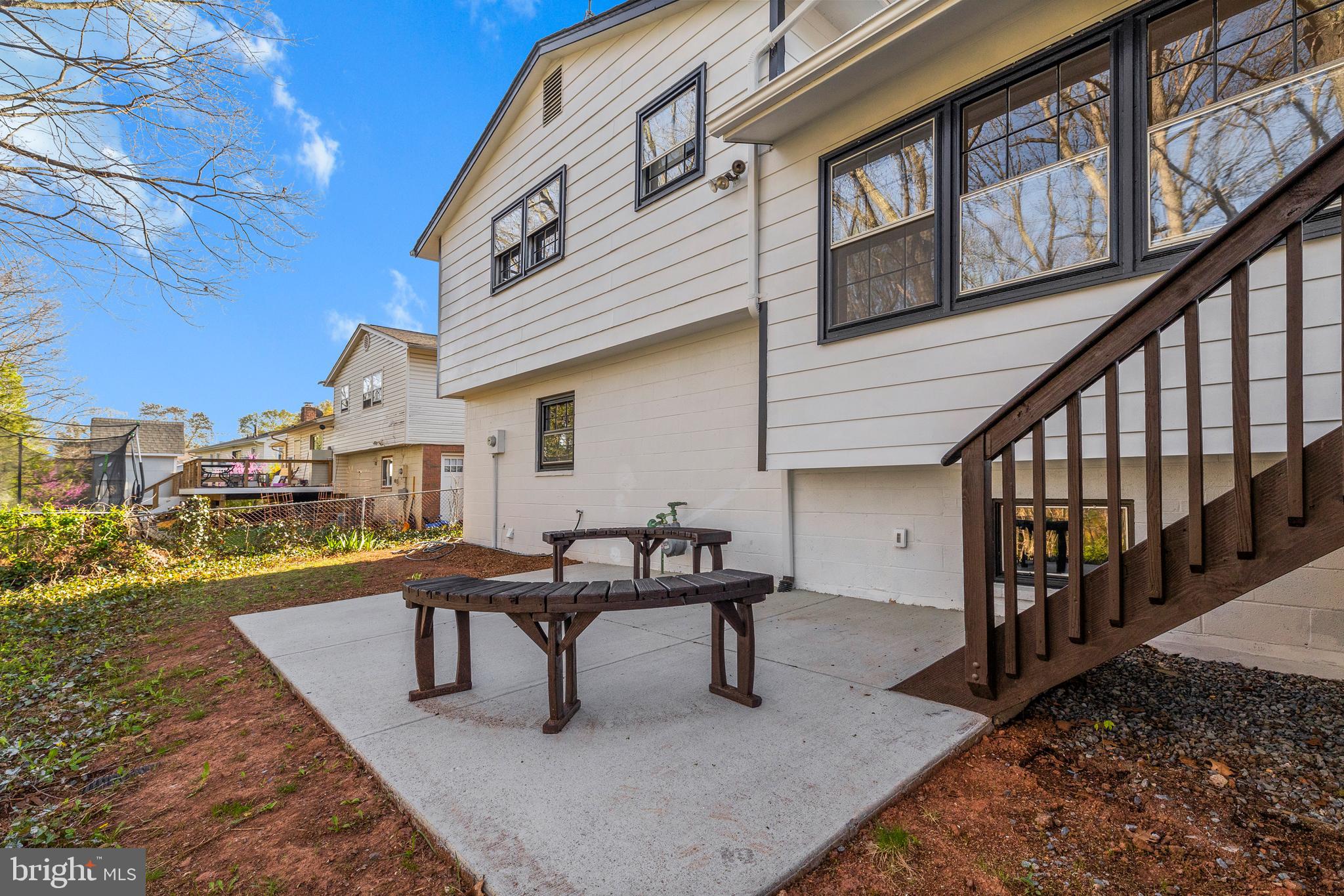 7517 Todd Place Manassas, VA 20109 - Photo 16 of 42 a view of a house with pool and wooden fence