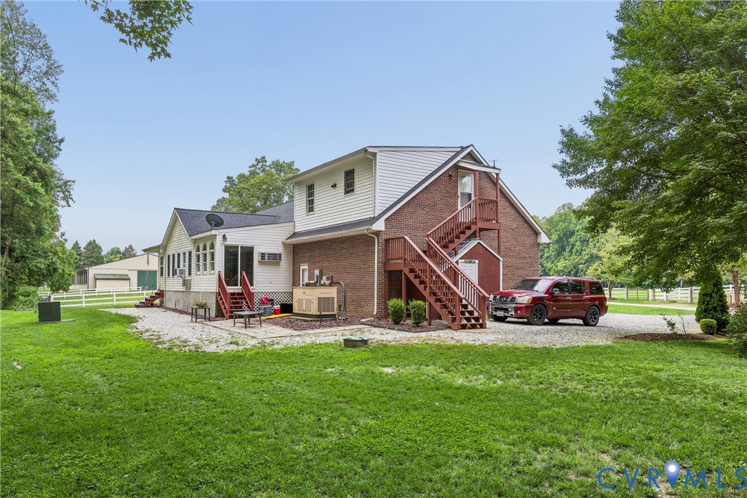 2016 Forge Road Toano, VA 23168 - Photo 30 of 99 Brick and siding exterior with a sunroom addition
