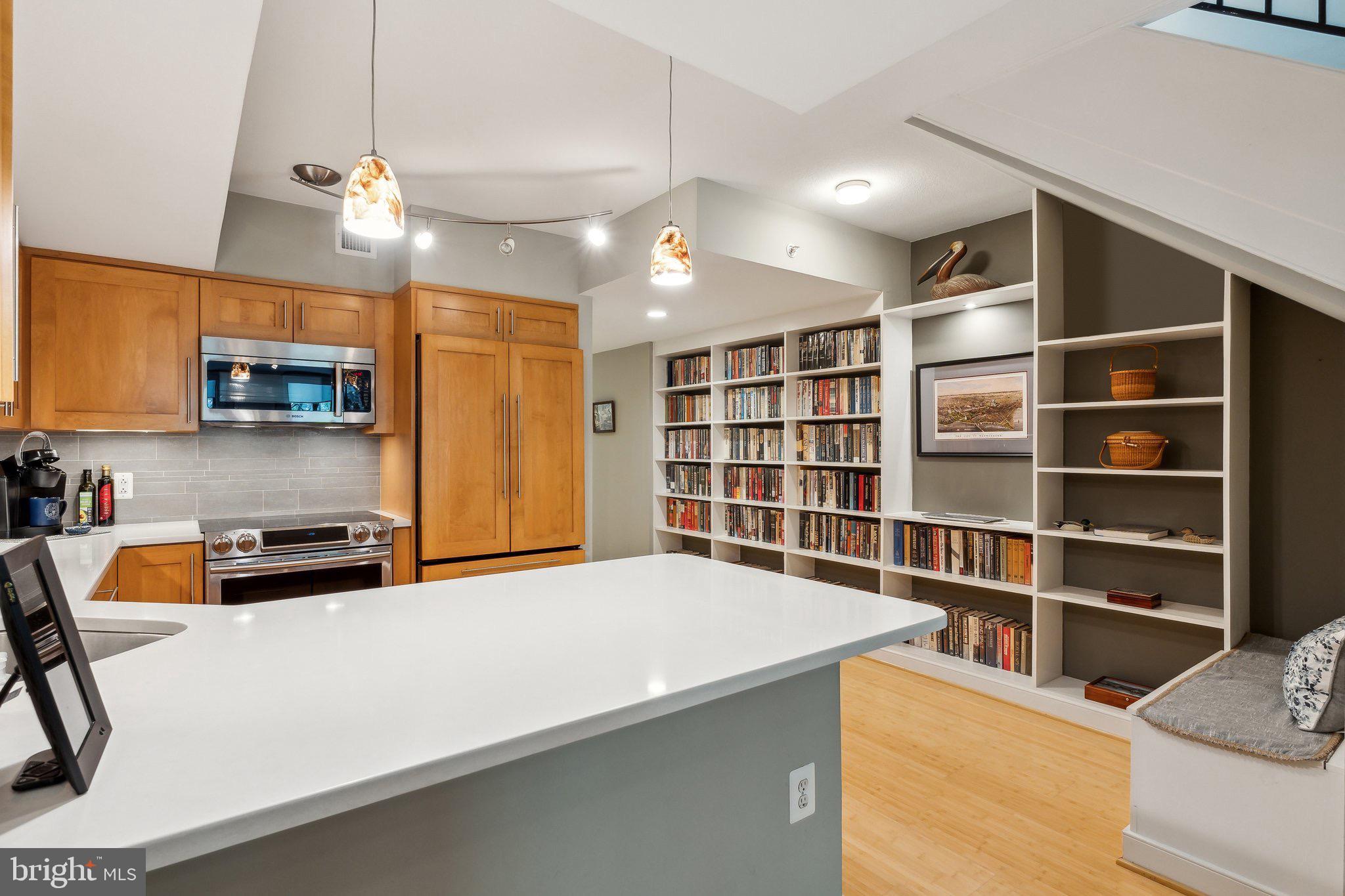 616 E Street Northwest, Unit 213 Washington, DC 20004 - Photo 5 of 80 Full-Size Kitchen with Quartz Countertops