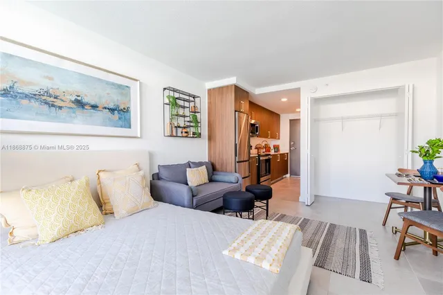 a bedroom with furniture and a couch