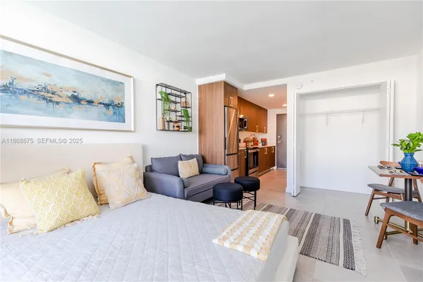 a bedroom with furniture and a couch