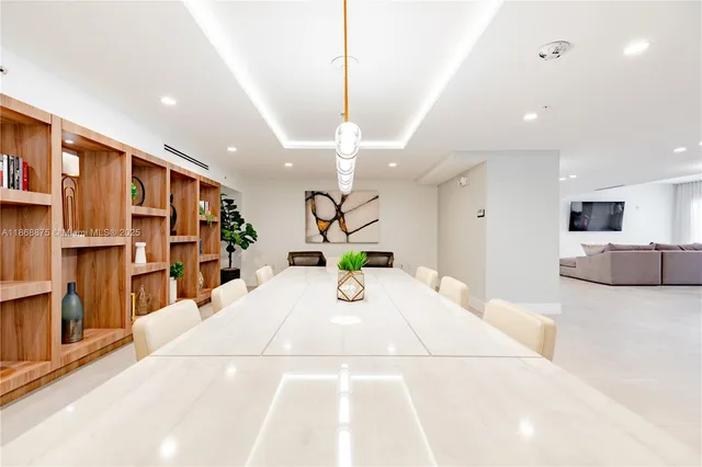 a view of a living room and kitchen