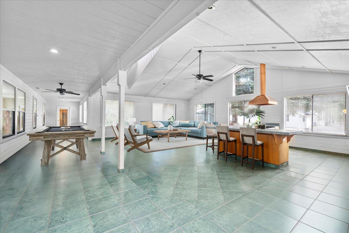 4616 Freelove Road Oakdale, CA 95361 - Photo 35 of 86 a view of a patio with dining table and chairs