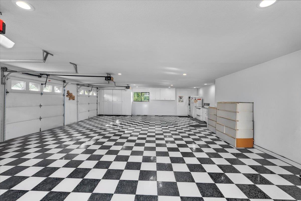 4616 Freelove Road Oakdale, CA 95361 - Photo 37 of 86 a room with a black white checkered floor with a black white checkered floor and a black white checkered floor