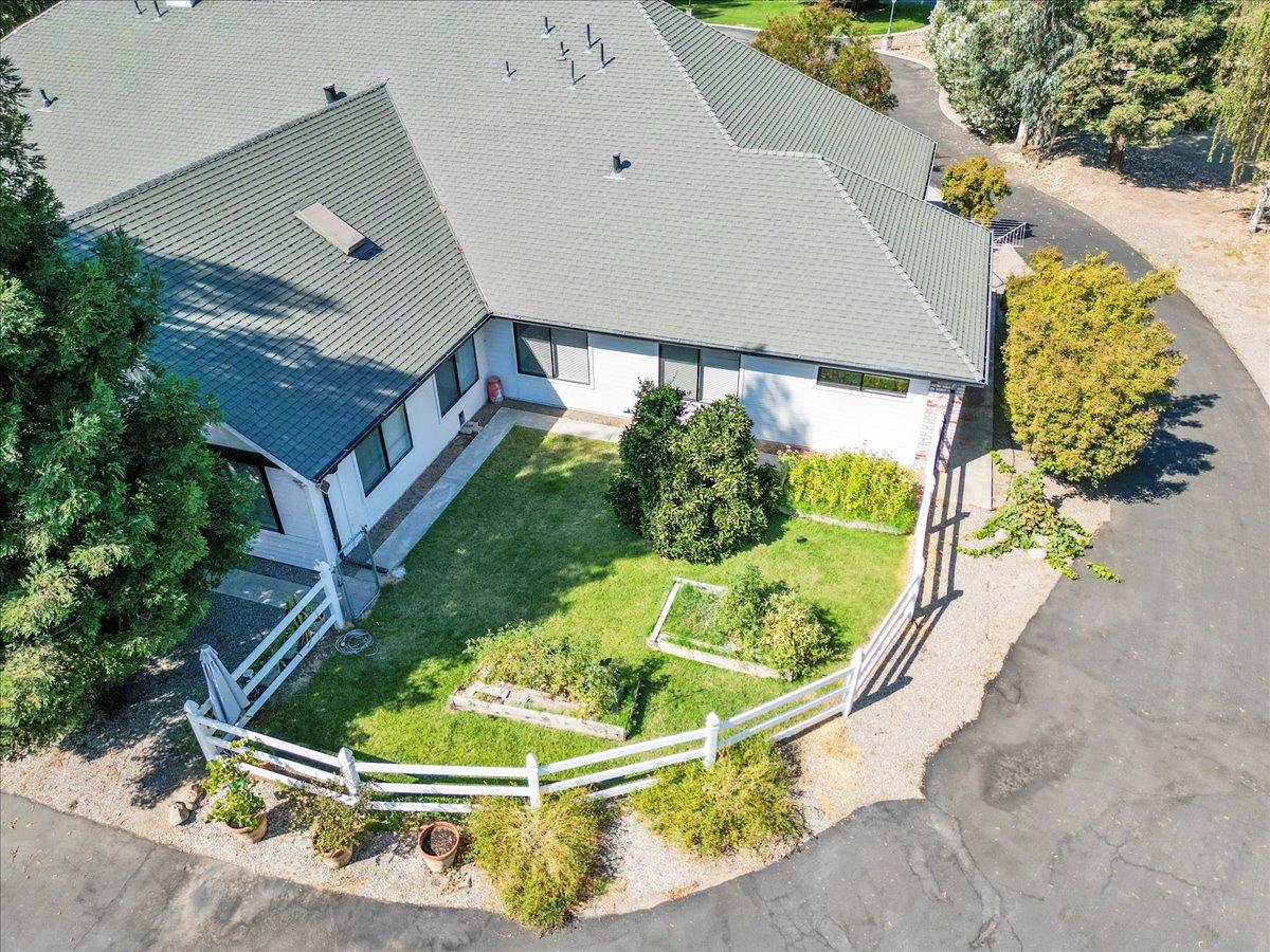 4616 Freelove Road Oakdale, CA 95361 - Photo 43 of 86 an aerial view of a house a yard and outdoor seating