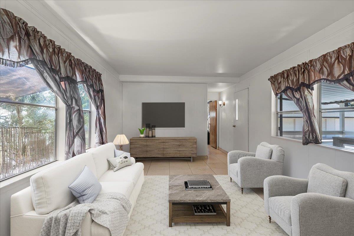 4616 Freelove Road Oakdale, CA 95361 - Photo 66 of 86 a living room with furniture and a flat screen tv