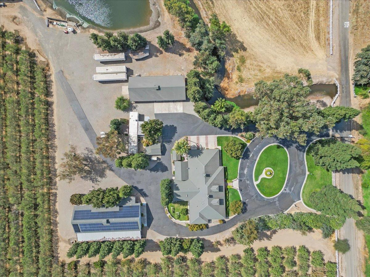 4616 Freelove Road Oakdale, CA 95361 - Photo 72 of 86 an aerial view of a house with garden space and street view