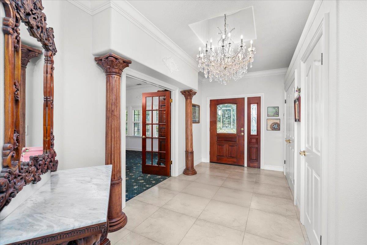 4616 Freelove Road Oakdale, CA 95361 - Photo 10 of 86 a view of an entryway with a chandelier