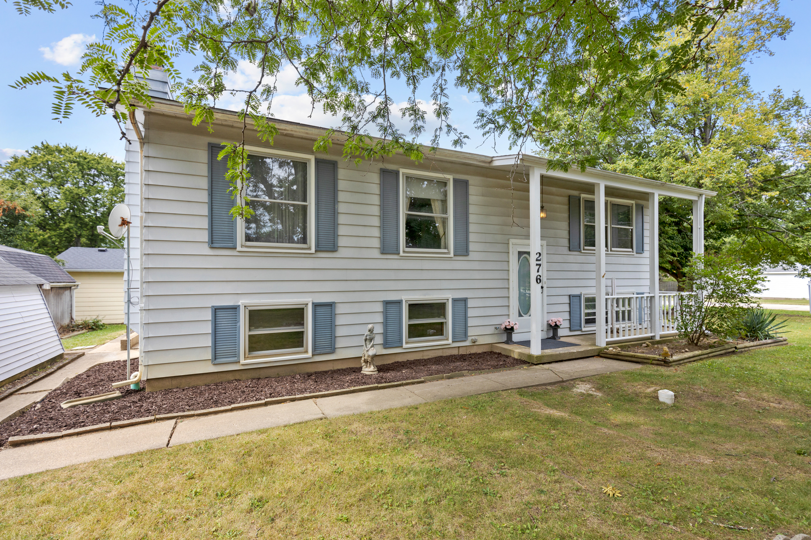 276 North 1st Street Gurnee, IL 60031 - Photo 1 of 1 a front view of a house with a yard