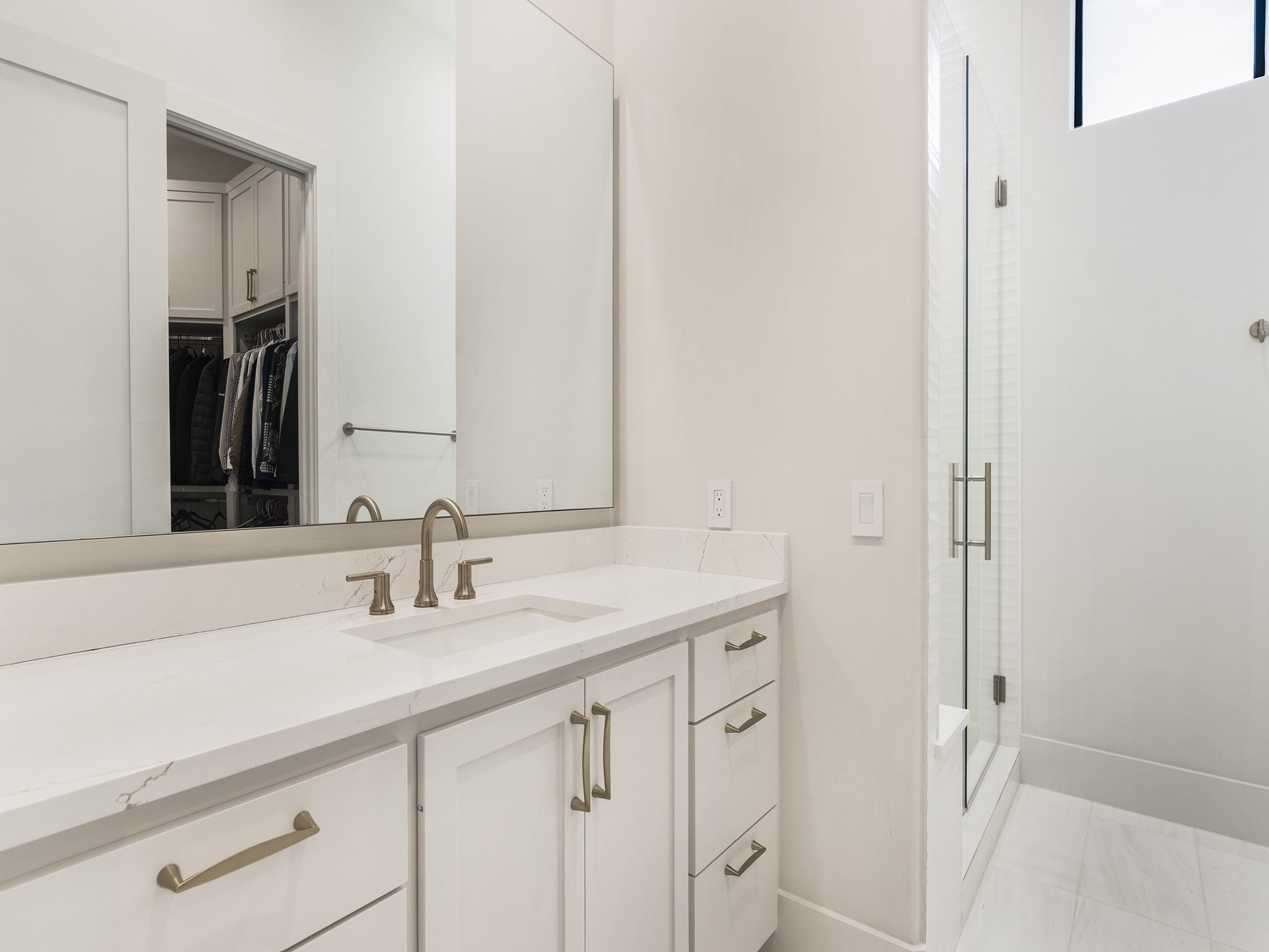 4024 Chatham Lane Houston, TX 77027 - Photo 38 of 50 a bathroom with a sink and a mirror