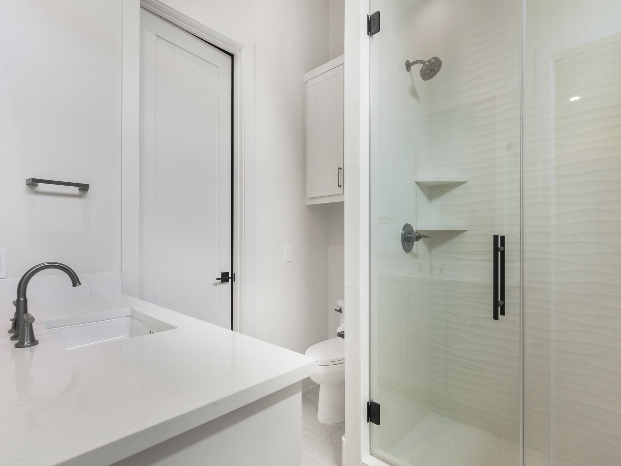 4024 Chatham Lane Houston, TX 77027 - Photo 45 of 50 a bathroom with a sink and shower