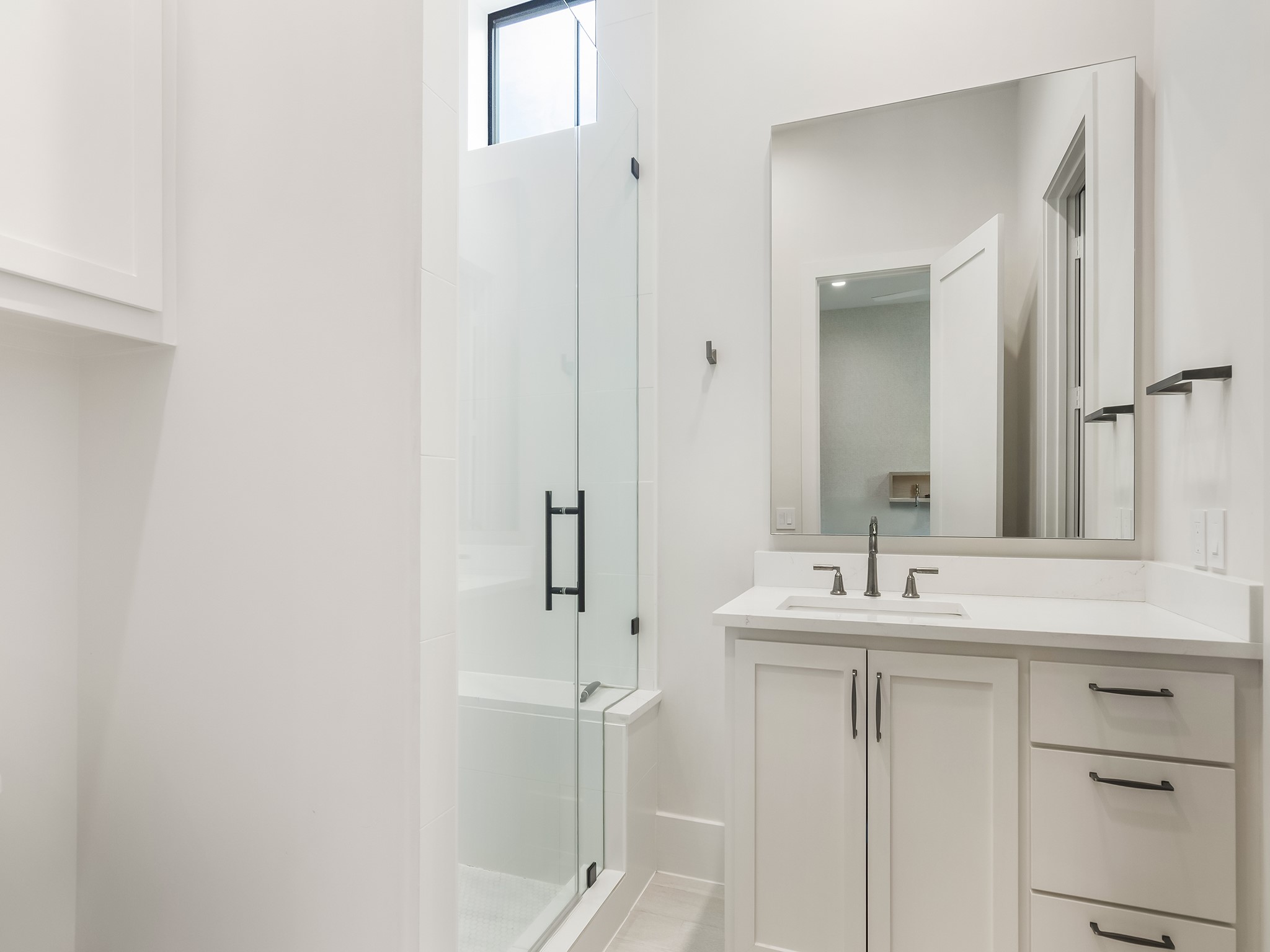 4024 Chatham Lane Houston, TX 77027 - Photo 48 of 50 a bathroom with a sink and a mirror